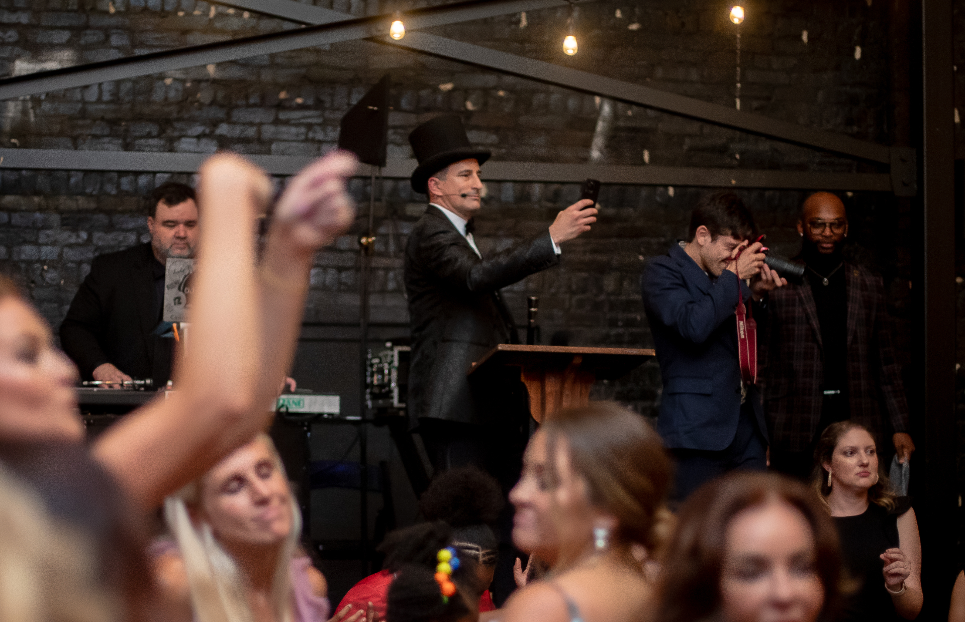 Corporate event DJ entertainment — branded company party on the dance floor